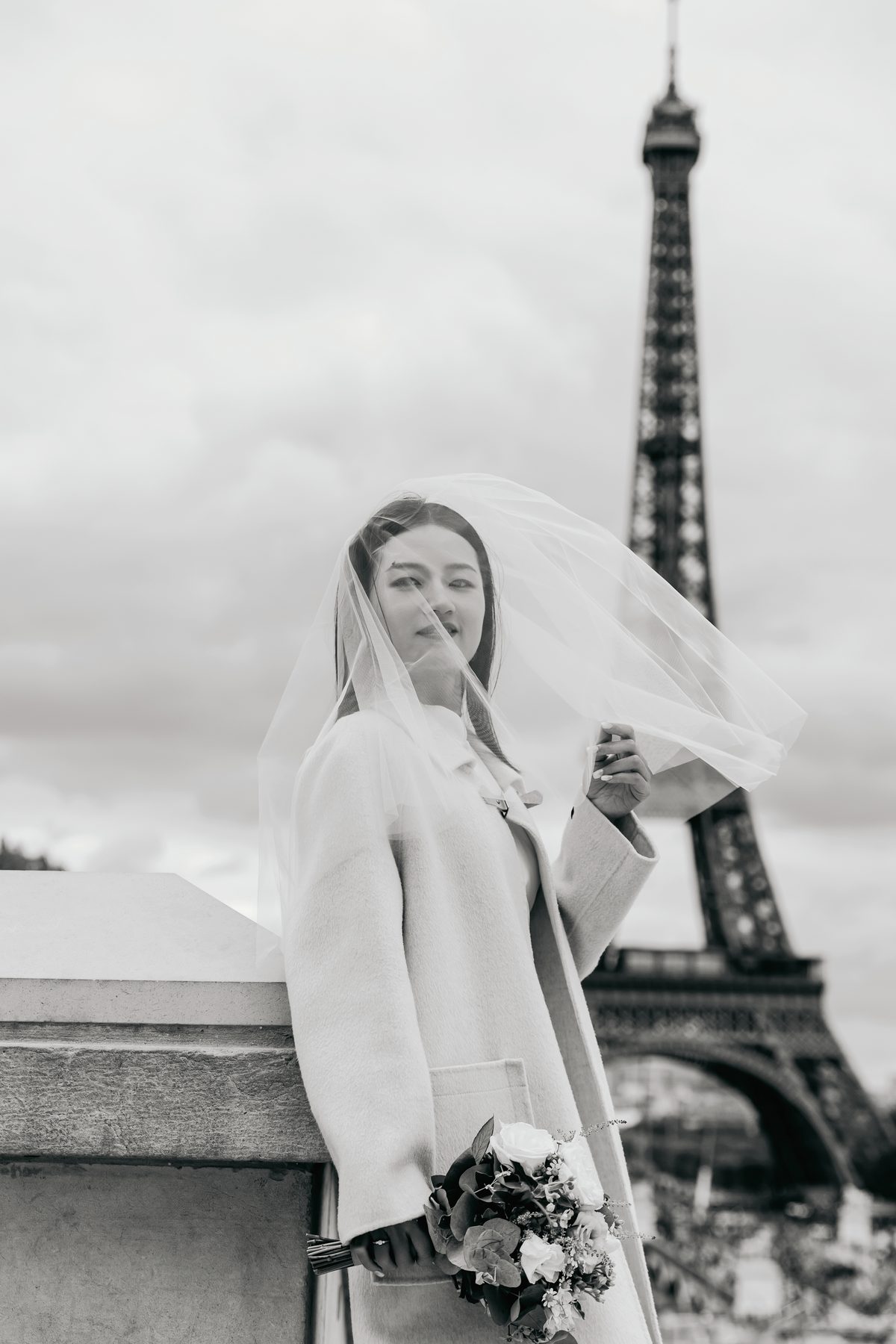 Black and white Paris couple photo