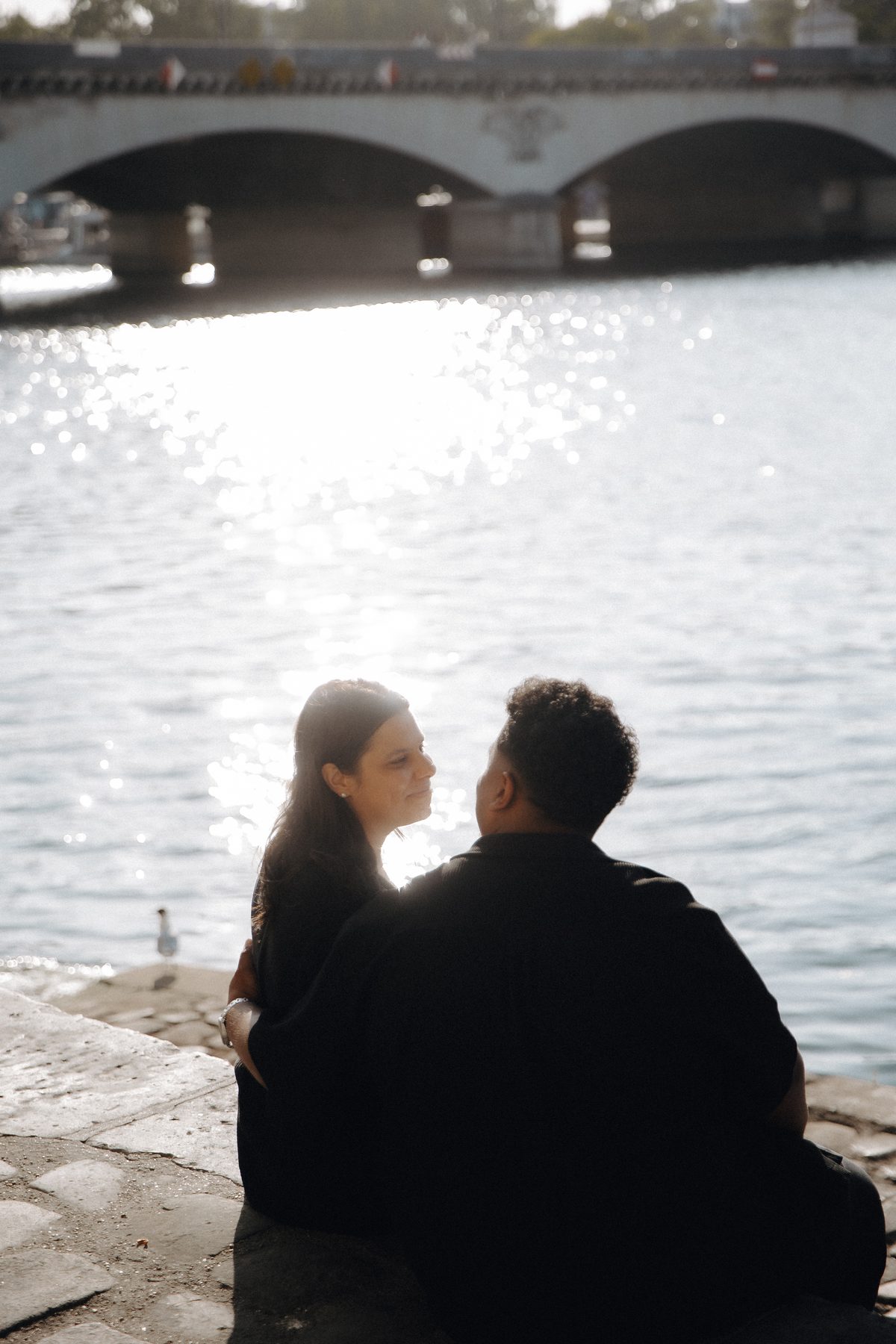 Paris couple silhouette by the Seine