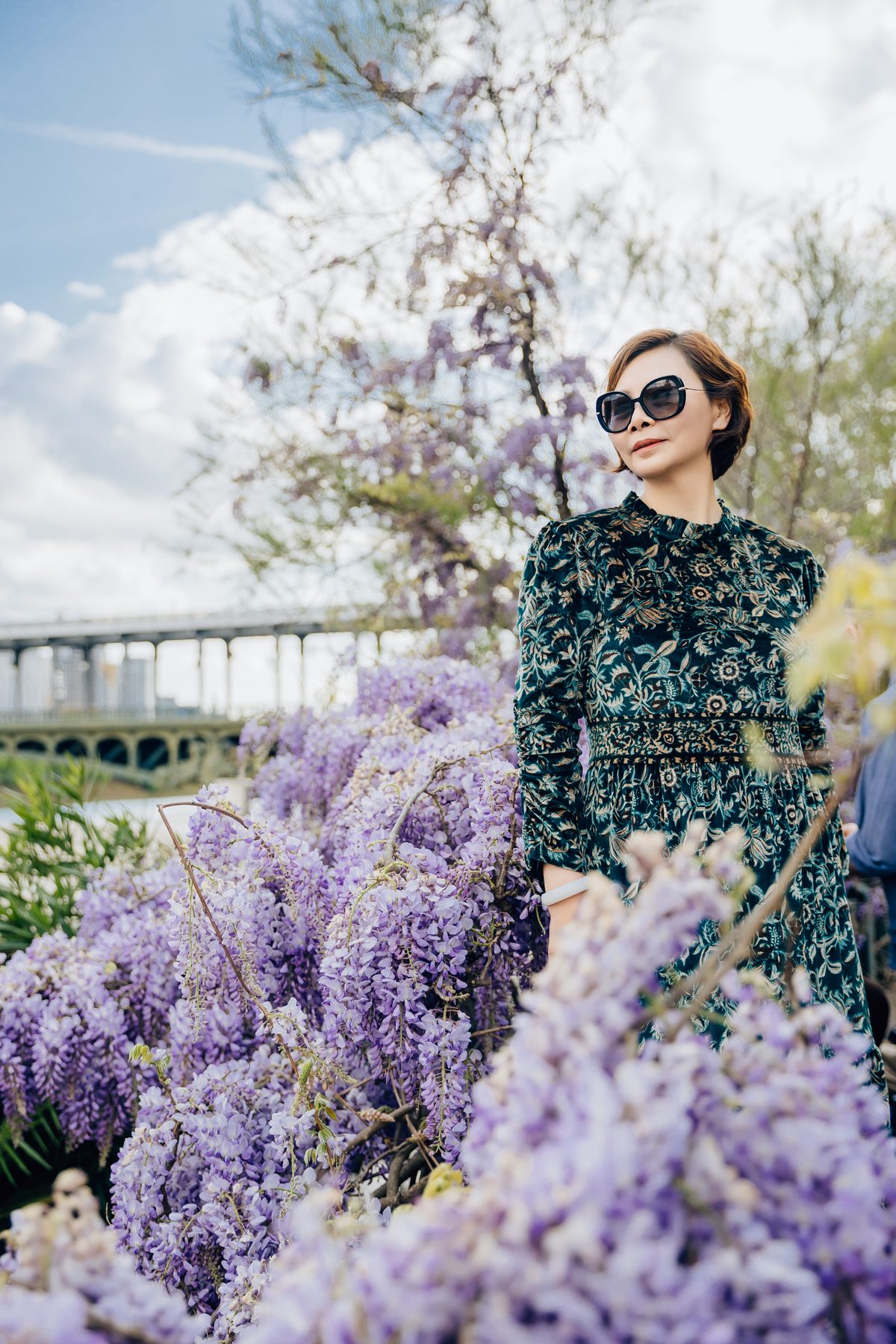 Solo traveler portrait in Paris spring flowers