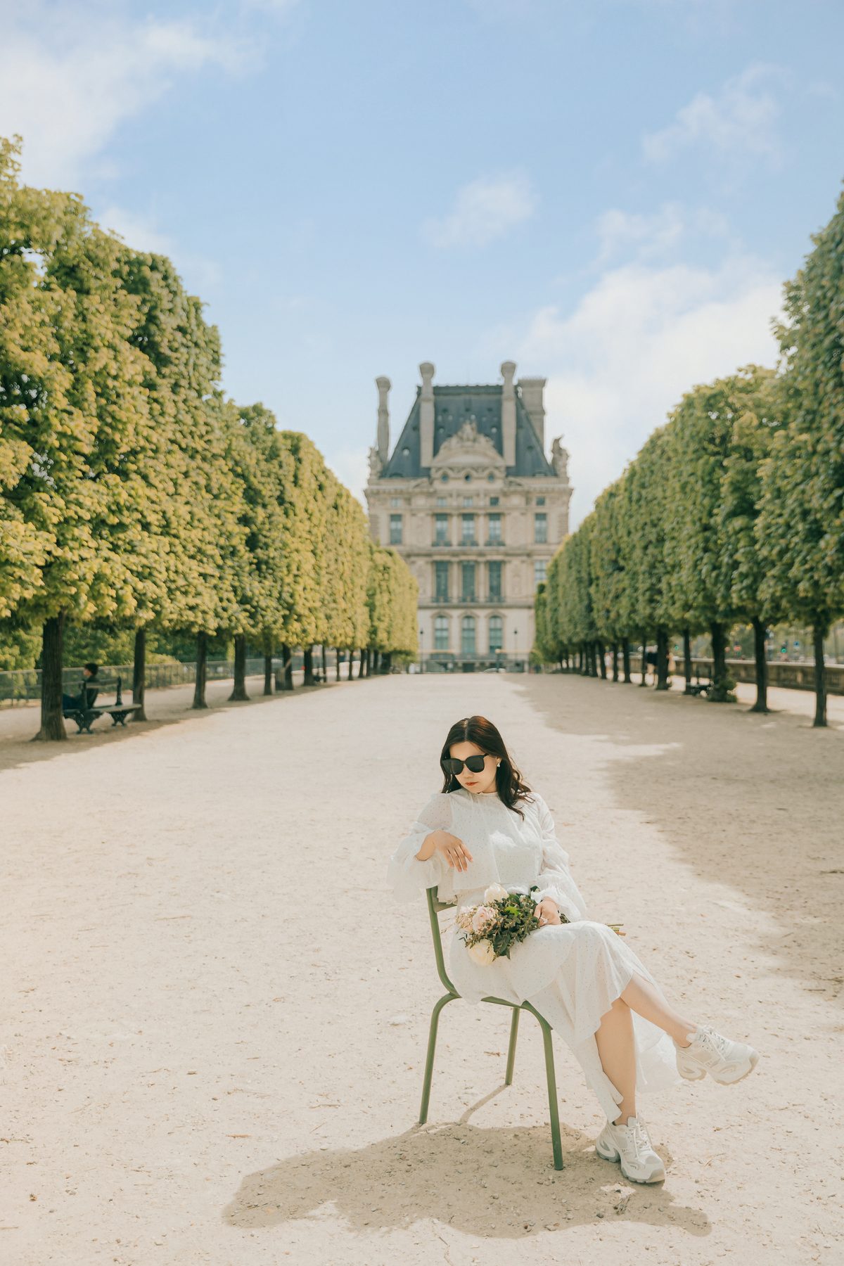 Solo travel portrait in the Tuileries Garden